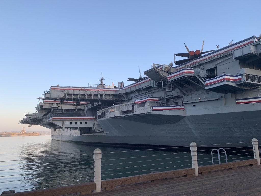 An aircraft carrier docked and set up as a museum