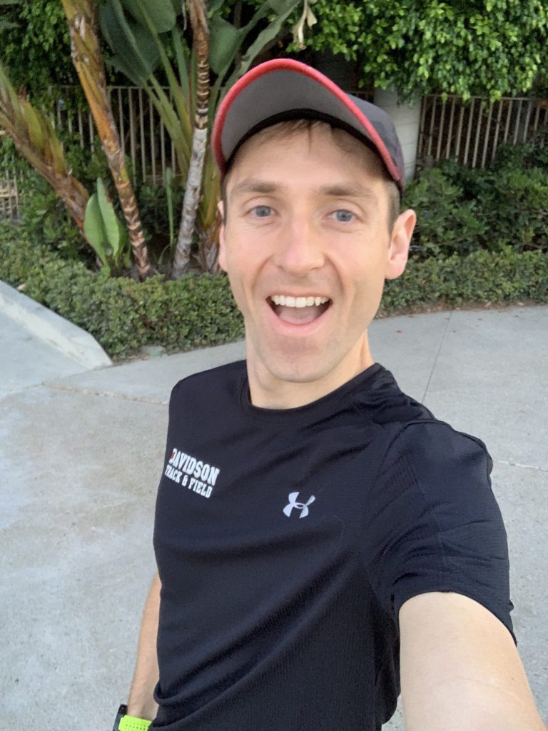 Mitch smiling for the camera right before beginning a morning jog
