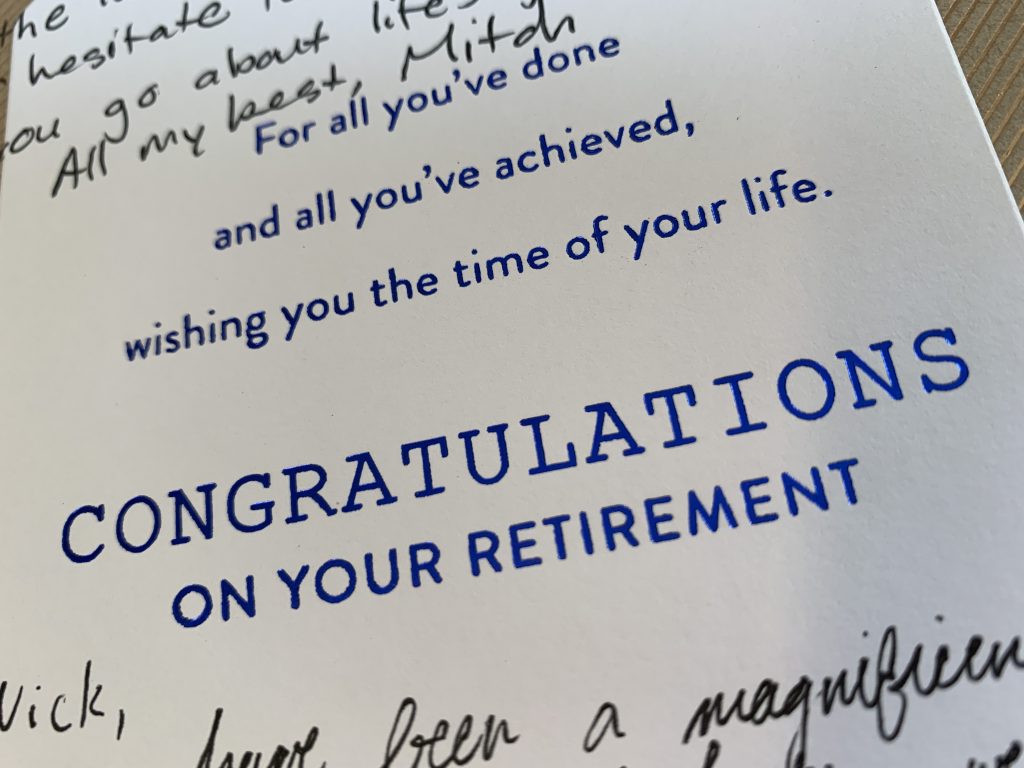 a close-up image of a card given to a student as a joke for their "retirement" from the research lab